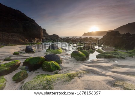 Sunset at Nanjizal, also known as Mill Bay, a beach and cove near Lands End, Cornwall Cornwall England UK Europe