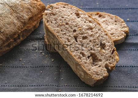 liced bread on grey fabric background