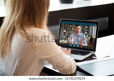 View over shoulder employer listen applicant at job interview online use cam and pc. To prevent spread corona virus covid19 infectious epidemia colleagues working distantly, self-isolation hr concept Royalty-Free Stock Photo #1678229824
