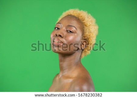 Stock image of attractive young black woman, concept of free self-esteemed black woman