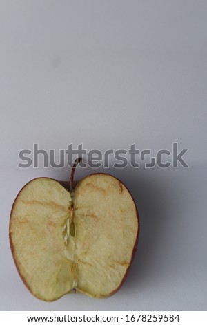 half not fresh apple on a white background