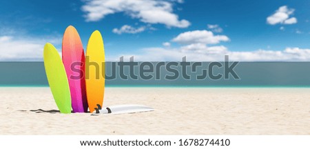 colorful surfboards on the beach, copy space for individual text Royalty-Free Stock Photo #1678274410