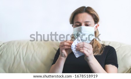 woman mask drugs - woman sick health care emergency with pills blister - useless coronavirus antibiotics against covid-19 . Royalty-Free Stock Photo #1678518919