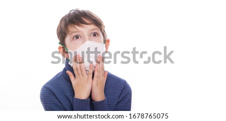 A child in a medical mask during the coronovirus in the world. Isolated on white background.