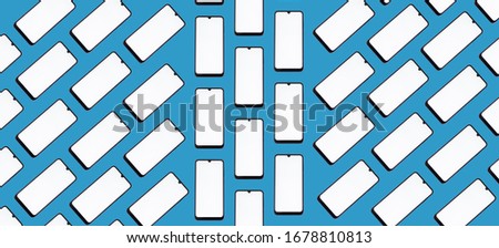 Smartphones with white screens on a blue background located vertically and diagonally make up a geometric pattern.