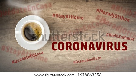 cup of coffee on wooden background of Coronavirus with virus illustration of global disease. Covid-19 concept and Stay at home sign