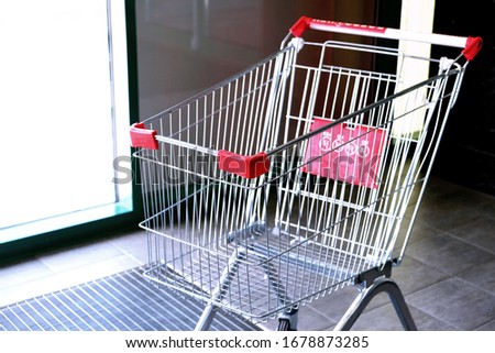 Empty cart at the supermarket. The fuss over the quarantine. Pandemic. Self-isolation.