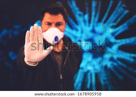Covid-19 and Air pollution pm2.5 concept. Man wearing mask for Virus and show stop hands gesture for stop corona virus outbreak. Covid19 coronavirus and epidemic virus symptoms.