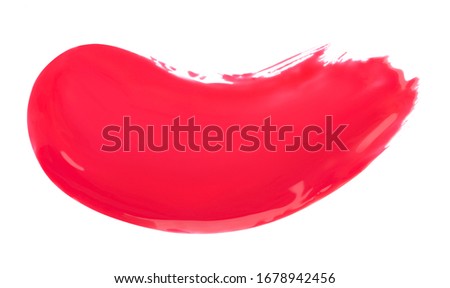 Pink liquid sample smear of lipstick or gel nail polish cosmetic isolated on white background.  Texture, top view.