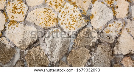 Stone wall texture in street old background