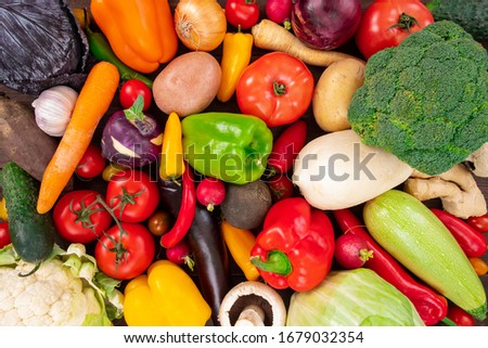 Raw fresh vegetables background. Healthy organic food concept Royalty-Free Stock Photo #1679032354