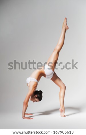 stretching woman with leg up