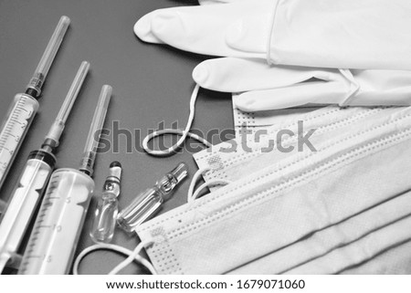 Medical equipment. Coronavirus protection. Medical face mask. Sterile gloves. Syringe and drugs. Doctor uniform for patient treatment in hospital. Prevention the spread of COVID-19.
