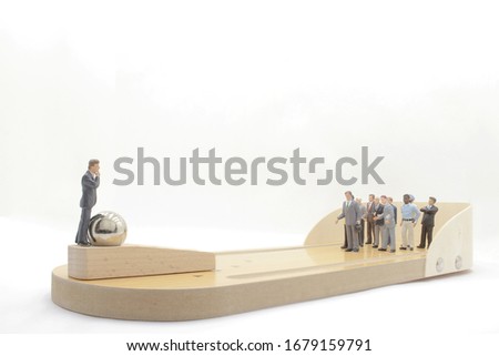businessman with bowling pin and ball, Business competition concept Fighting 