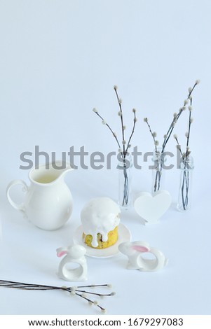 Festive Easter spring composition with pussy willow branches with catkins and eggs.Easter Background.Springtime. Invitation card design with copy space. Easter card template.Selective focus Copy spase