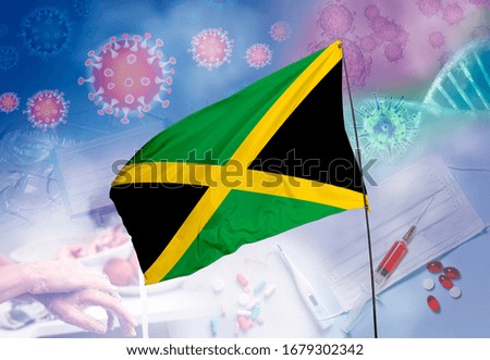 Coronavirus (COVID-19) outbreak and coronaviruses influenza background as dangerous flu strain cases as a pandemic medical health risk. Jamaica Flag with corona virus and their prevention.