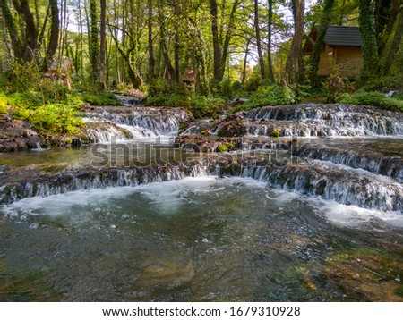 Cascades on the Janj mountain stream near Sipovo in the middle of October in the autumn season. - Image