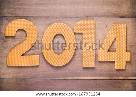 New Year date on old wood background