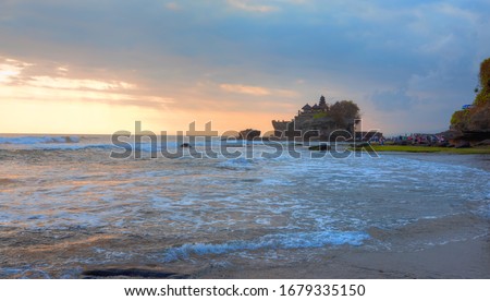 Tanah Lot Temple at sunset - Most important hindu temple - Bali, Indonesia