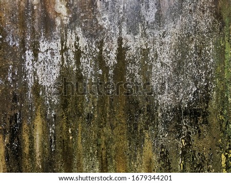 Abstract photo of grunge exterior of old dirty concrete wall textured background use as classic simple plain backdrop ,wallpaper has blank space designed for inserting texts on dark tone surface