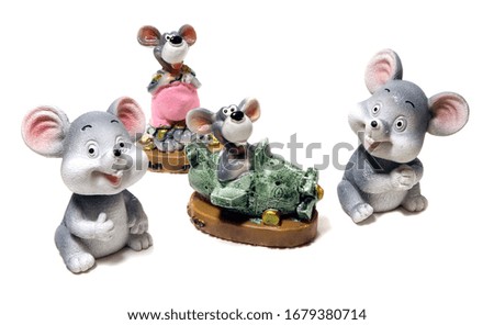 A figurine of mouses isolated. A ceramic figurine mice isolated.