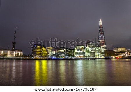 City of London on Thames. Sunset and city lights