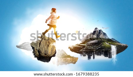 Little girl walking a landscape