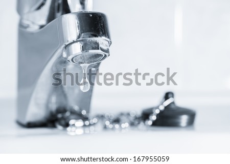 Old faucet leak out, sink in bathroom, tinted black and white image Royalty-Free Stock Photo #167955059