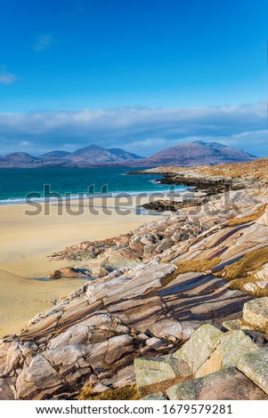 Blue skies over Traigh Rosamol beach at Luskentyre on the Isle of Harris in the Western isles of Scotland