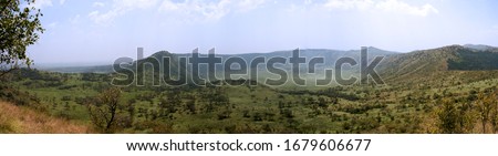Around 7,000 years before present the habitat of Queen Elizabeth region was rent by massive volcanic activity causing localised extinctions and a complete change to the geomorphology of the region  Royalty-Free Stock Photo #1679606677