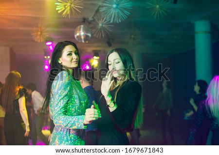 Rest of beautiful young girls in nightclub