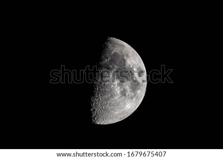 Highly detailed picture of a half moon