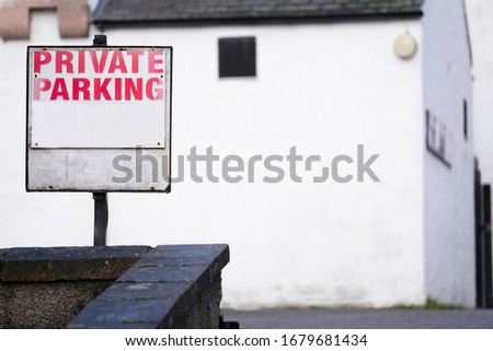 Private parking sign at hotel car park