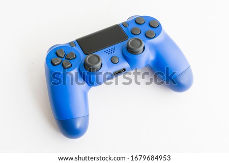 A joystick controller on the white isolated background, blue colored