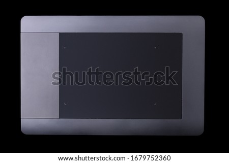 Top view of graphic tablet for illustrators, designers and photographers isolated on black background with clipping path