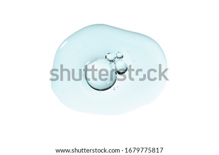 Serum smear smudge swatch with collagen and peptides. Skin care gel transparent sample blue drop with bubble isolated on white background. Emulsion texture. Anti aging woman beauty cosmetic product. Royalty-Free Stock Photo #1679775817