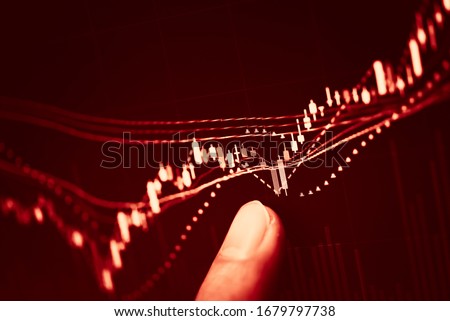 Stock market data on digital LED display. Fundamental and technical analysis with candle stick graph chart of stock market trading to represent about Bullish and Bearish point.
