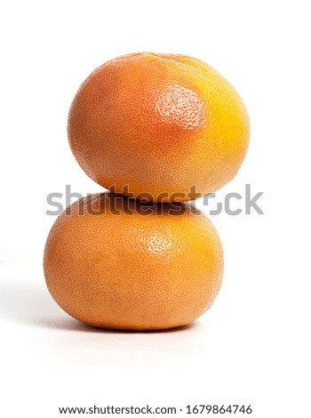 two grapefruits isolated on a white background