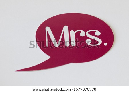 red plate with the inscription Mrs. on a white background, isolate