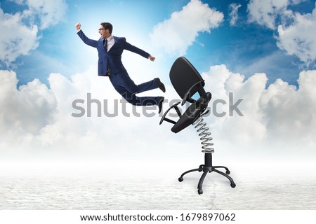 Promotion concept with businessman ejected from chair Royalty-Free Stock Photo #1679897062