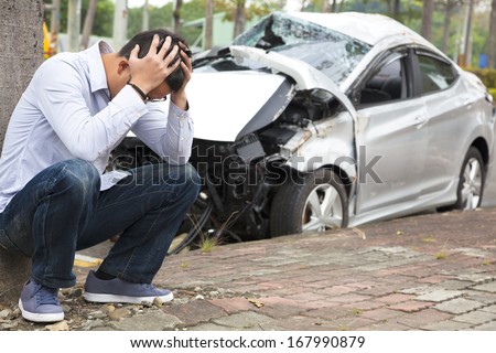  Upset driver After Traffic Accident Royalty-Free Stock Photo #167990879
