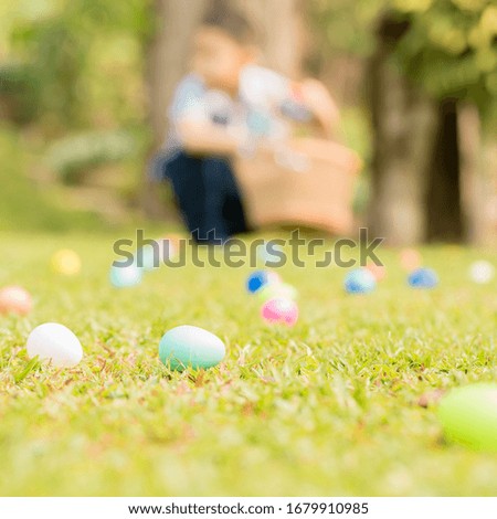 Blurred silhouettes of children with baskets in hands. the concept of family fun at Easter. easter eggs hunt. blurred background. Cope space for your text