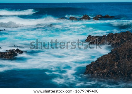 Long Exposure Of Sea Wave with rock