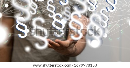 A male hand and section signs with blurred background Royalty-Free Stock Photo #1679998150
