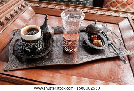 Turkish coffee and tea with delight and traditional copper serving set.