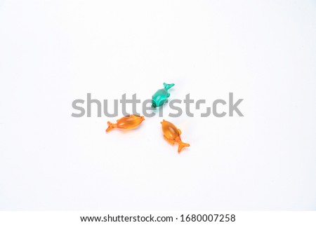 Colored fish shaped pills. This is the development trend of pediatric medical industry in the future. Lovely shaped capsules can make children not afraid to take medicine.