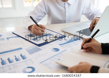Business and Financial concept .financial team corporate  discussing assessment and evaluation of corporate showing the results of their successful teamwork. Royalty-Free Stock Photo #1680054187