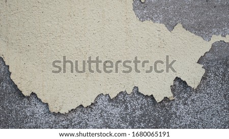 Old weathered cement wall background texture.