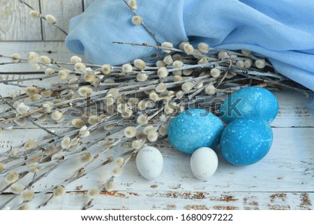 Blue Easter eggs on light background. Naturally Eggs painted with hibiscus and red cabbage with marble stone effect.Eco paint. Happy Easter card. Selective focus.