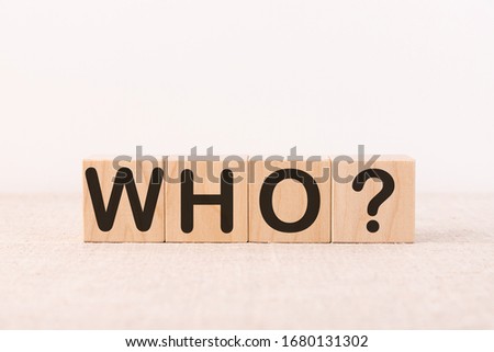 WHO word concept written on a light table and light background